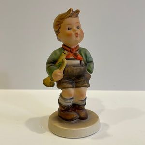 Hummel boy with trumpet fingering